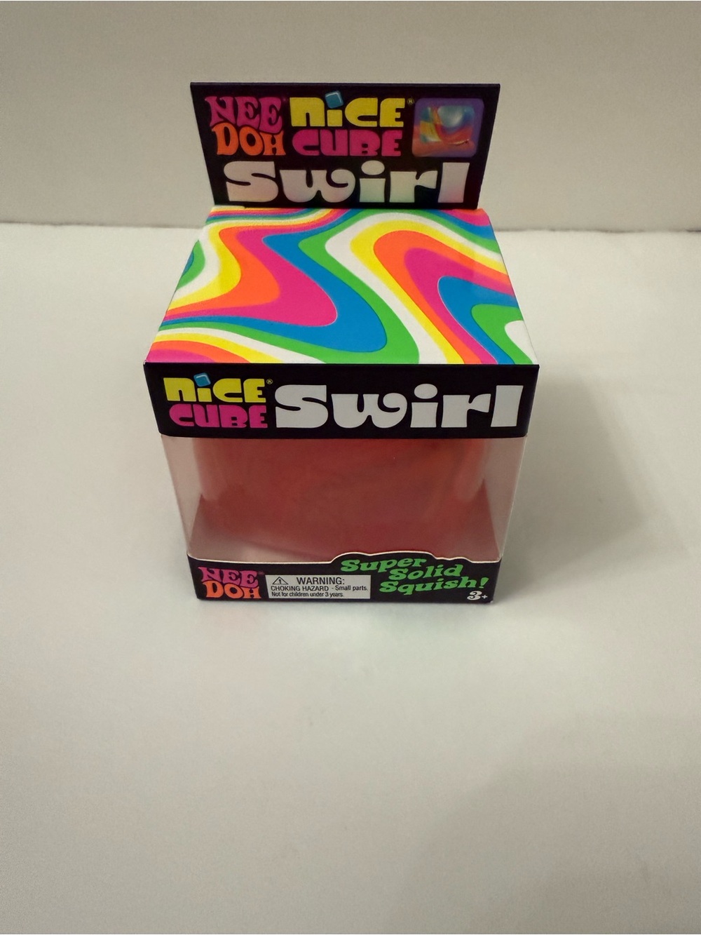 NeeDoh Nice Cube Swirl Super Solid Squish Multicolor Orange